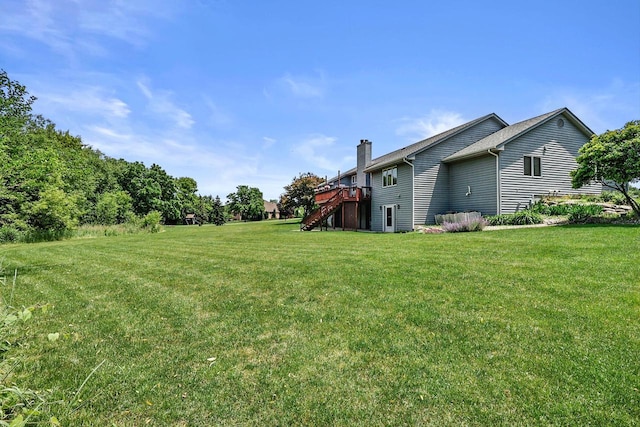 6320 10th Pl, Kenosha, WI 53144 - view of green lawn featuring stairway and a deck