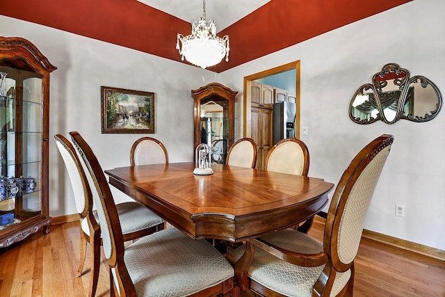 6320 10th Pl, Kenosha, WI 53144 - dining room featuring hardwood / wood-style flooring and a chandelier