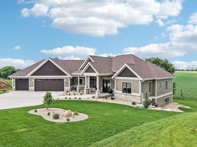 3330 Colton Way, Sun Prairie, WI 53590 - craftsman inspired home featuring stone siding, a garage, a front lawn, concrete driveway, and roof with shingles