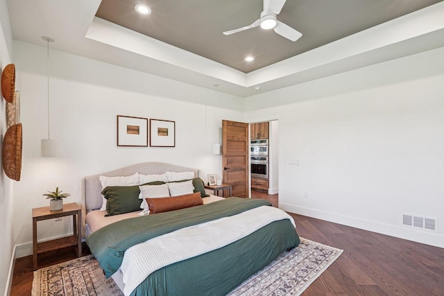 3330 Colton Way, Sun Prairie, WI 53590 - bedroom with wood finished floors, recessed lighting, a tray ceiling, and ceiling fan