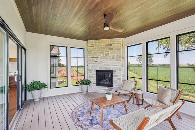 3330 Colton Way, Sun Prairie, WI 53590 - sunroom / solarium featuring ceiling fan and a stone fireplace