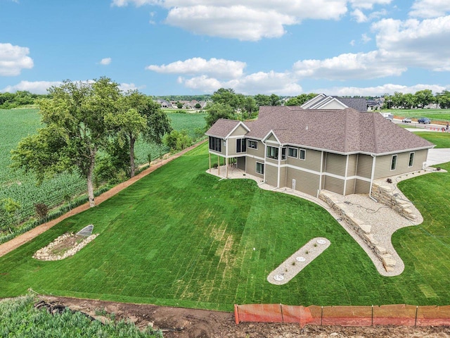 3330 Colton Way, Sun Prairie, WI 53590 - view of front of home with a front lawn, a patio area, and roof with shingles