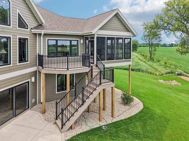 3330 Colton Way, Sun Prairie, WI 53590 - view of front facade with a shingled roof, stairway, a front yard, and a sunroom