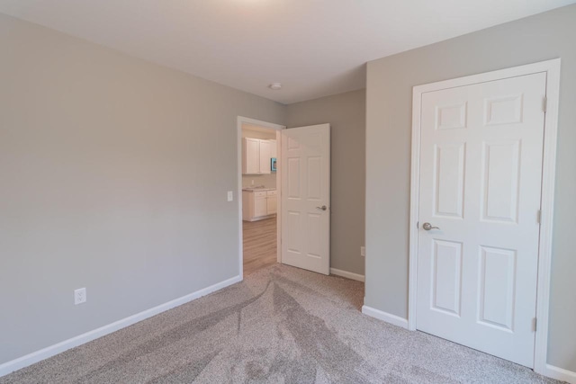 219 Joe St, Stevens Point, WI 54481 - unfurnished bedroom with carpet floors and baseboards