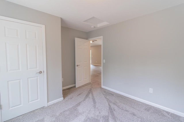 219 Joe St, Stevens Point, WI 54481 - unfurnished bedroom featuring carpet flooring and attic access