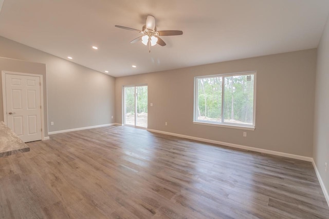 219 Joe St, Stevens Point, WI 54481 - unfurnished room featuring a ceiling fan, wood finished floors, and recessed lighting