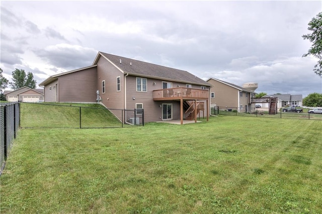 1814 Lynnette Ct, Eau Claire, WI 54703 - rear view of house featuring stairway, a deck, and a fenced backyard