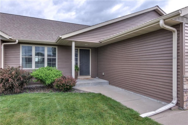 1814 Lynnette Ct, Eau Claire, WI 54703 - entrance to property with a yard and a shingled roof