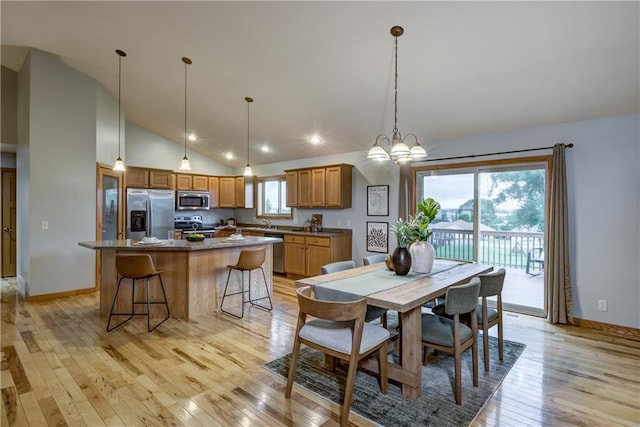 1814 Lynnette Ct, Eau Claire, WI 54703 - dining room with light wood-type flooring, recessed lighting, and high vaulted ceiling