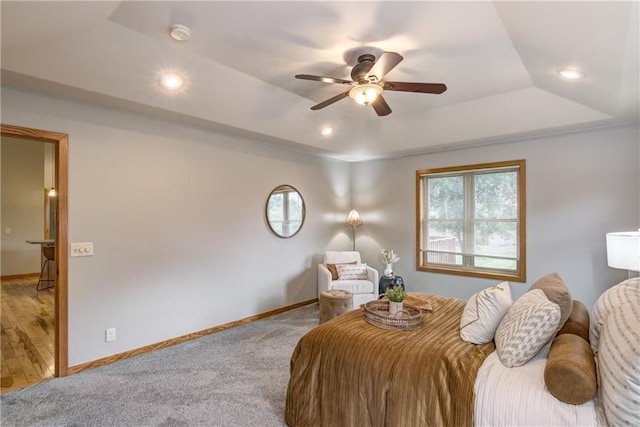 1814 Lynnette Ct, Eau Claire, WI 54703 - carpeted bedroom with a raised ceiling, recessed lighting, and a ceiling fan