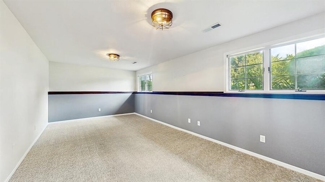 701 Devils Ln, Walworth, WI 53184 - carpeted spare room with baseboards