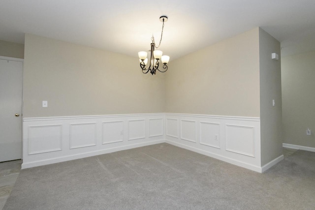 18520 Emerald Cir Unit D, Brookfield, WI 53045 - carpeted spare room with a chandelier and a wainscoted wall