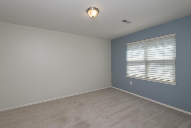 18520 Emerald Cir Unit D, Brookfield, WI 53045 - spare room featuring baseboards and light colored carpet