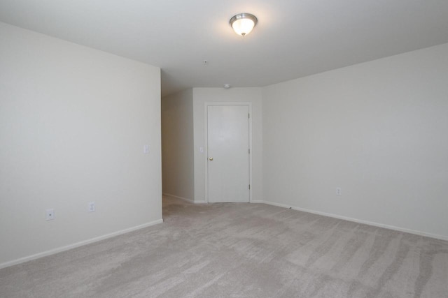 18520 Emerald Cir Unit D, Brookfield, WI 53045 - unfurnished room with light colored carpet and baseboards