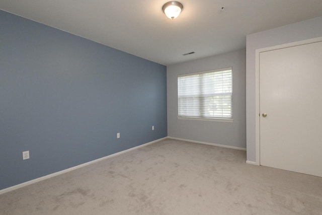 18520 Emerald Cir Unit D, Brookfield, WI 53045 - spare room with carpet and baseboards