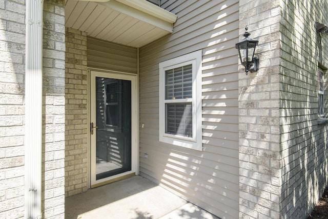 18520 Emerald Cir Unit D, Brookfield, WI 53045 - property entrance featuring brick siding