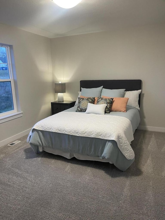 W214N6683 Fairview Dr, Menomonee Falls, WI 53051 - carpeted bedroom with baseboards