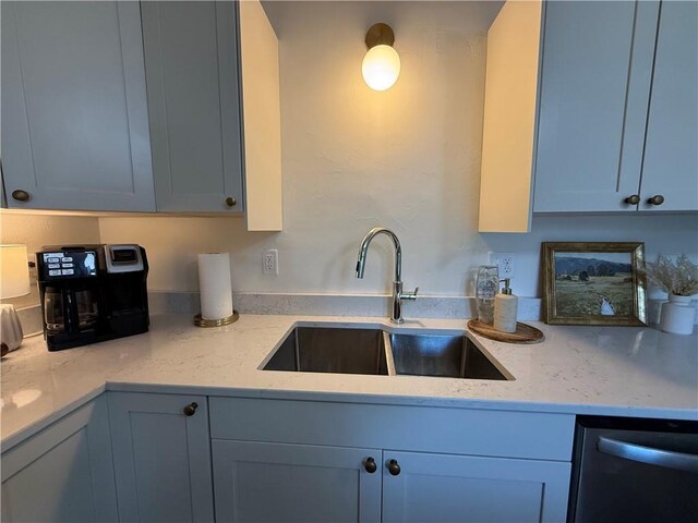 15 S Culver St, Chippewa Falls, WI 54729 - kitchen featuring stainless steel dishwasher and light stone countertops