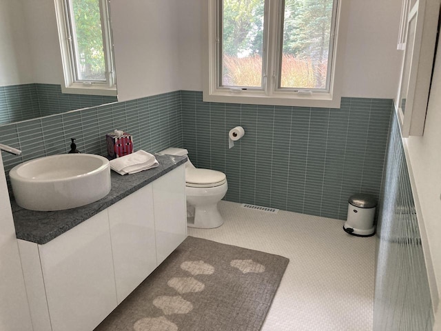 N155 Surfside Dr, Cedar Grove, WI 53013 - bathroom with a wainscoted wall, vanity, and tile walls