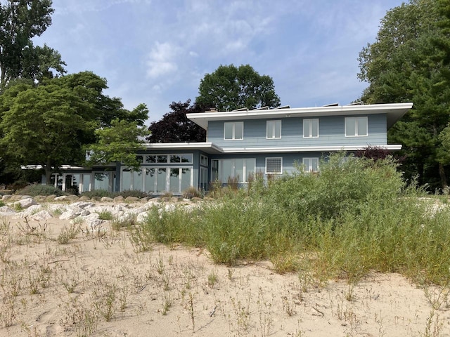 N155 Surfside Dr, Cedar Grove, WI 53013 - rear view of property featuring a sunroom