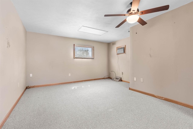 114 S Adam St, South Beloit, IL 61080 - carpeted spare room with baseboards and a ceiling fan