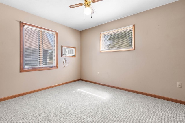 114 S Adam St, South Beloit, IL 61080 - carpeted empty room featuring a ceiling fan and a wall mounted air conditioner