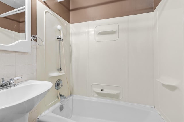 114 S Adam St, South Beloit, IL 61080 - bathroom with decorative backsplash and shower / bathtub combination