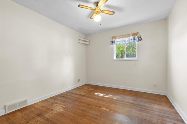 114 S Adam St, South Beloit, IL 61080 - empty room with wood-type flooring and ceiling fan