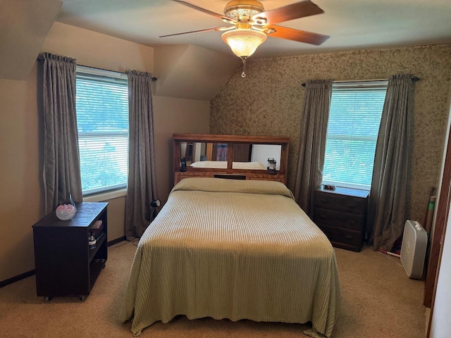 710 Jefferson St, Merrill, WI 54452 - carpeted bedroom featuring wallpapered walls, ceiling fan, and vaulted ceiling