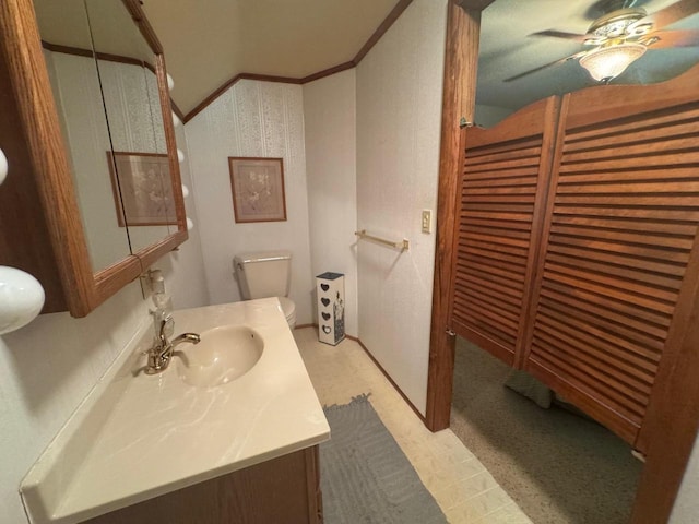 710 Jefferson St, Merrill, WI 54452 - half bathroom with vanity, ornamental molding, a ceiling fan, and tile patterned floors