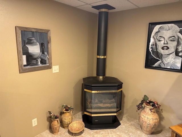 710 Jefferson St, Merrill, WI 54452 - detailed view of a drop ceiling and a wood stove
