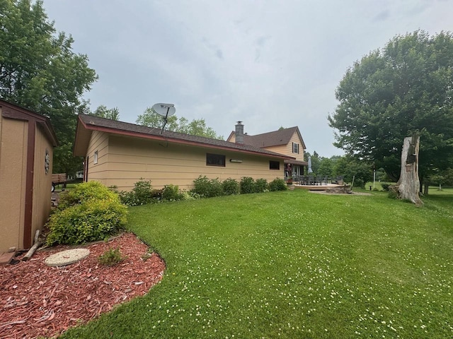 710 Jefferson St, Merrill, WI 54452 - view of green lawn featuring a wooden deck