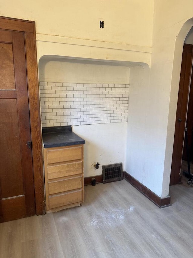 2320 W Hope Ave Unit 2320A, Milwaukee, WI 53209 - detailed view of arched walkways and wood finished floors