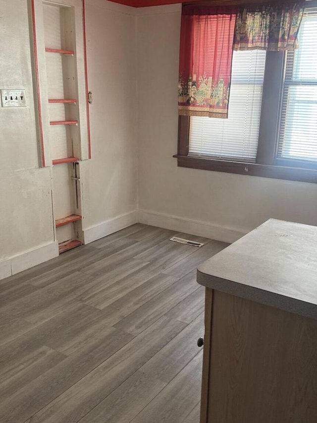 2320 W Hope Ave Unit 2320A, Milwaukee, WI 53209 - spare room with baseboards and wood finished floors