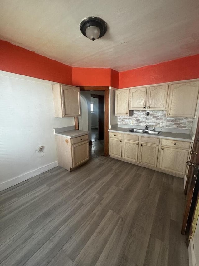 2320 W Hope Ave Unit 2320A, Milwaukee, WI 53209 - kitchen with dark wood-type flooring, decorative backsplash, and light countertops