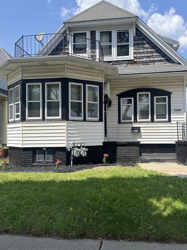 2320 W Hope Ave Unit 2320A, Milwaukee, WI 53209 - view of side of home with a yard, a balcony, and a shingled roof