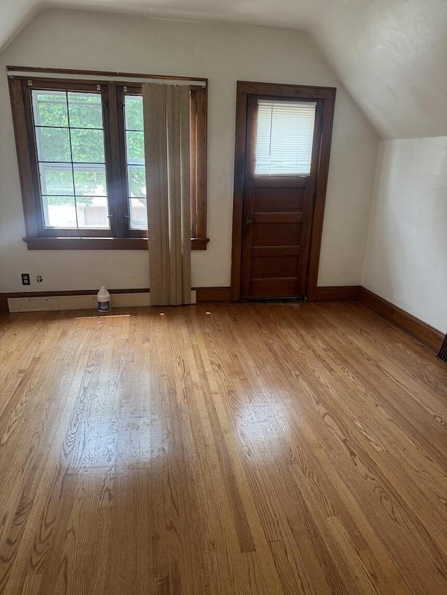 2320 W Hope Ave Unit 2320A, Milwaukee, WI 53209 - entryway featuring vaulted ceiling and light wood-style floors