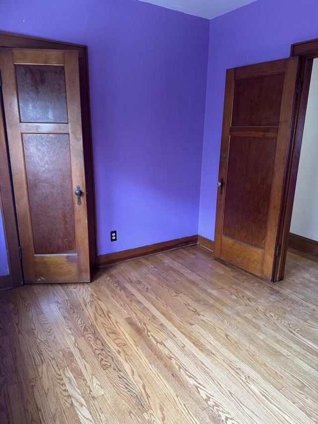 2320 W Hope Ave Unit 2320A, Milwaukee, WI 53209 - unfurnished bedroom featuring wood finished floors