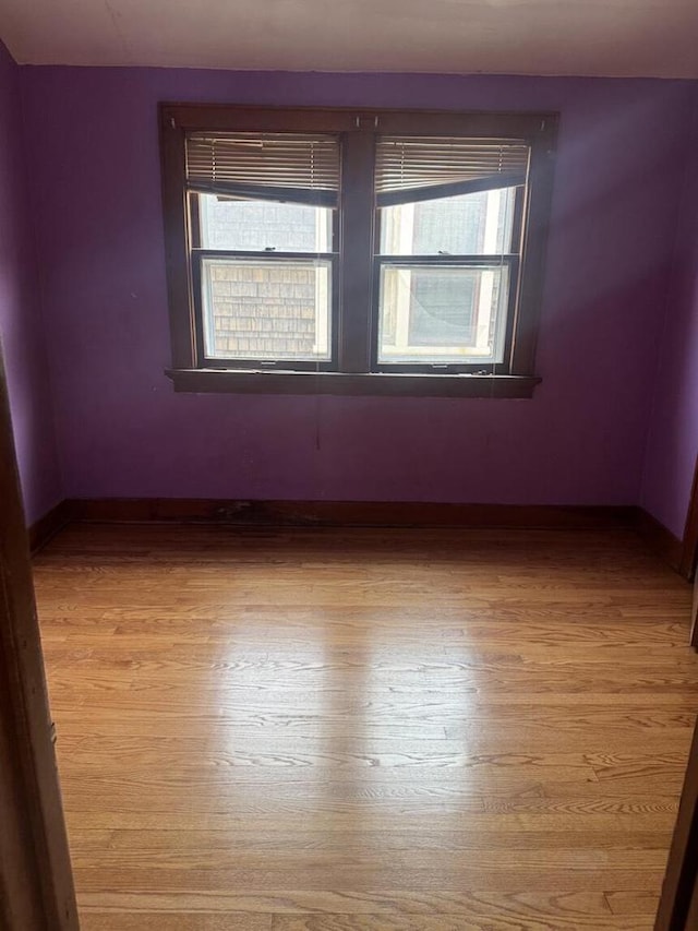 2320 W Hope Ave Unit 2320A, Milwaukee, WI 53209 - empty room with plenty of natural light and light wood finished floors