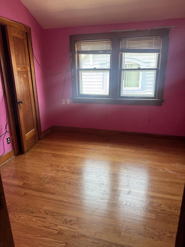 2320 W Hope Ave Unit 2320A, Milwaukee, WI 53209 - spare room with wood finished floors and baseboards