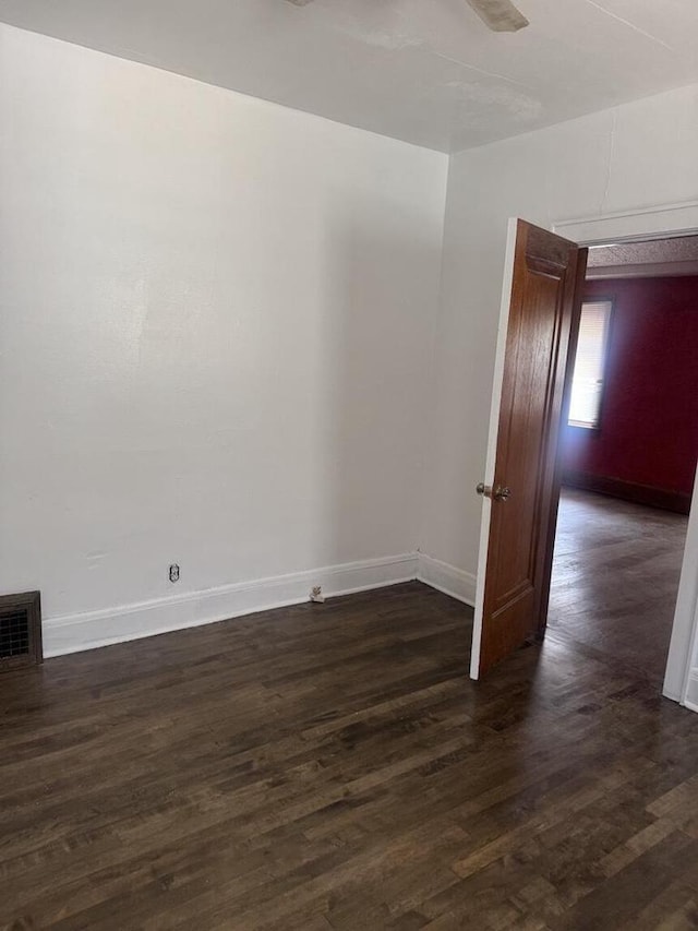 2320 W Hope Ave Unit 2320A, Milwaukee, WI 53209 - unfurnished room with dark wood-type flooring and baseboards