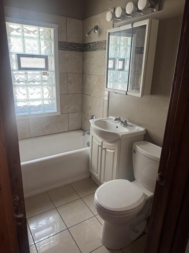 2320 W Hope Ave Unit 2320A, Milwaukee, WI 53209 - full bathroom featuring vanity,  shower combination, and tile patterned flooring