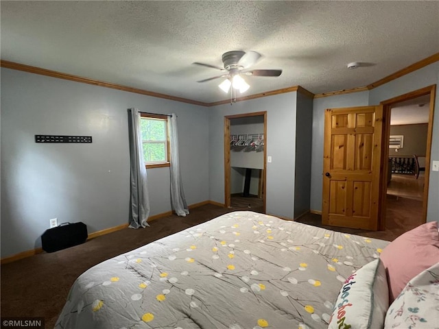 1283 230th Ave, Luck, WI 54853 - carpeted bedroom with ornamental molding, a textured ceiling, ceiling fan, and a closet