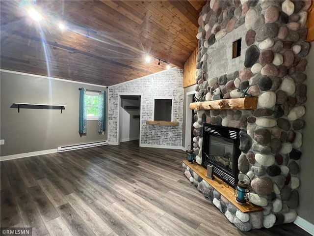 1283 230th Ave, Luck, WI 54853 - living area featuring wooden ceiling, lofted ceiling, a baseboard radiator, a stone fireplace, and wood finished floors