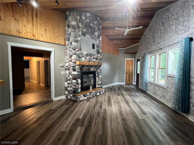 1283 230th Ave, Luck, WI 54853 - living area featuring a ceiling fan, high vaulted ceiling, a stone fireplace, wood ceiling, and wood finished floors
