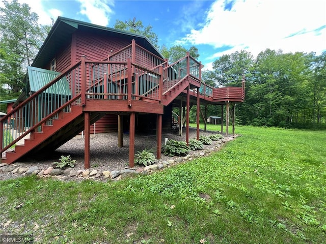 1283 230th Ave, Luck, WI 54853 - back of property featuring stairway, a deck, and a lawn