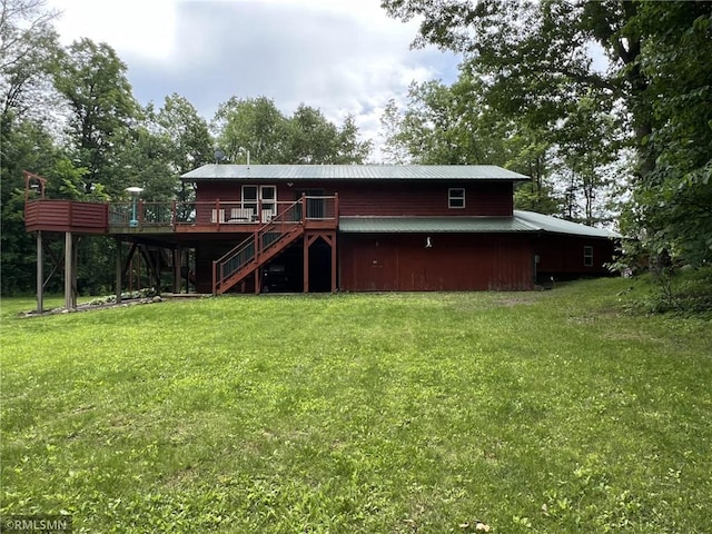 1283 230th Ave, Luck, WI 54853 - back of house with stairs, a wooden deck, and a lawn