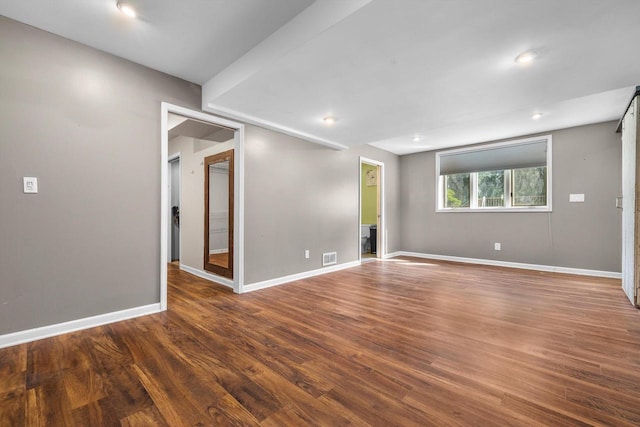 8020 Ridgeway Dr, Burlington, WI 53105 - unfurnished room featuring wood finished floors and recessed lighting