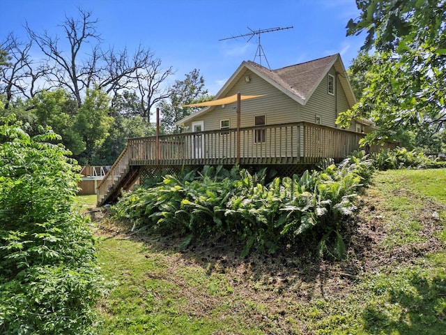 8020 Ridgeway Dr, Burlington, WI 53105 - view of side of property with a wooden deck and stairs