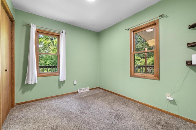 8020 Ridgeway Dr, Burlington, WI 53105 - carpeted empty room with baseboards